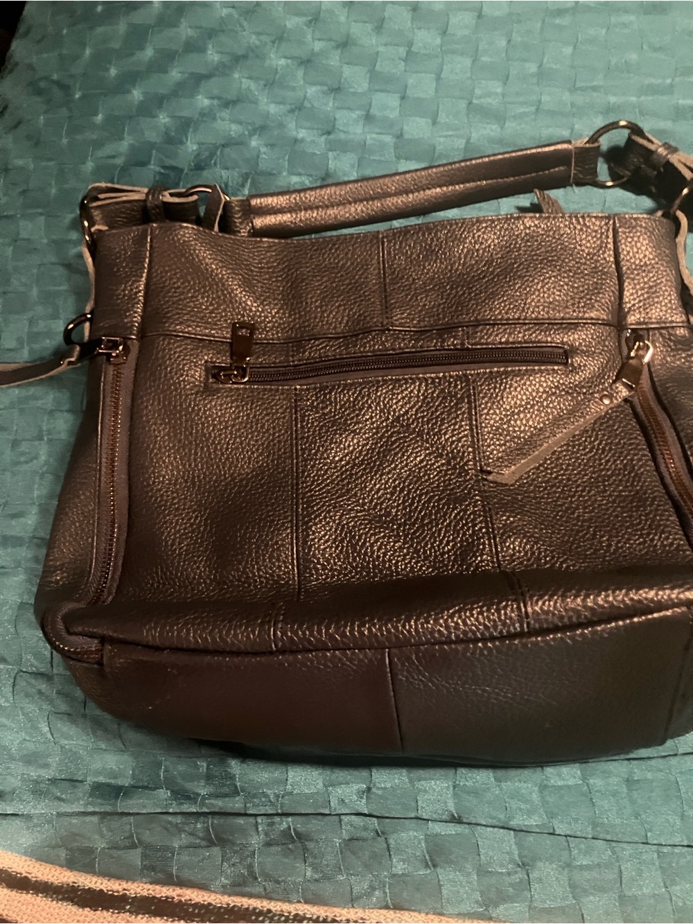 B. Makowsky blue leather shoulder bag , never used , zip pockets with gun metal